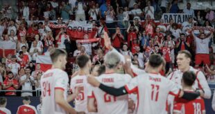 Polish volleyball team celebrating a point during a match