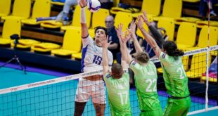 Greek volleyball player celebrating a point during a match