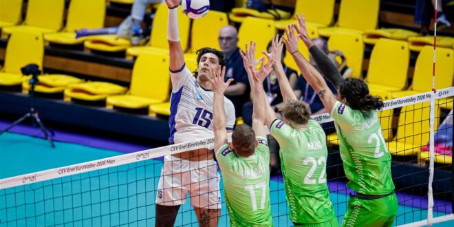 Greek volleyball player celebrating a point during a match