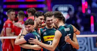 Slovenian volleyball player celebrating a point during a match
