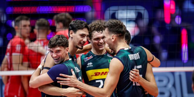 Slovenian volleyball player celebrating a point during a match