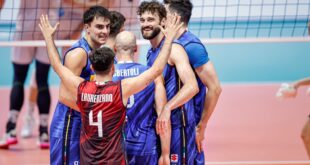 Italian volleyball team celebrating a point during a match
