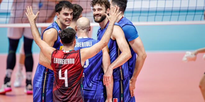 Italian volleyball team celebrating a point during a match
