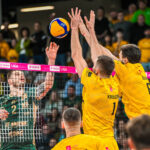 Volleyball players in action during a Polish men's league match