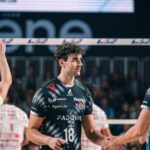 Volleyball players in action during a match