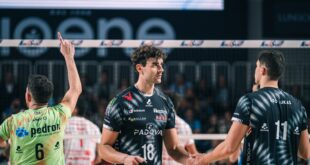 Volleyball players in action during a match