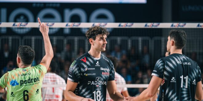 Volleyball players in action during a match