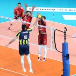 Volleyball players in action during a Turkish Efeler Ligi match